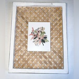 Picture frame with a woven rattan insert and a white floral print picture.(3Cnt)